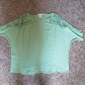 Green top with crochet detail